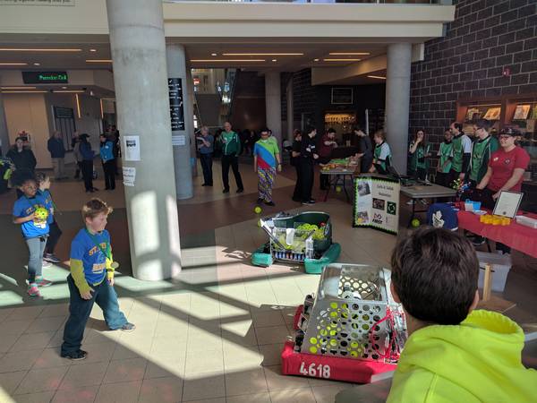 Kids having fun with Penelope and 4618 Newman Robotics at the HWCDSB System Science Fair