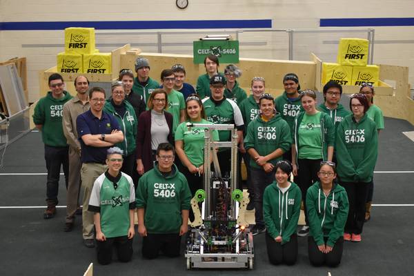 Team photo with Debra Harrison, President of John Deere Canada