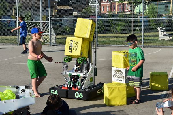 Kids having fun with Tipsy at the Keith Neighbourhood Strawberry Festival