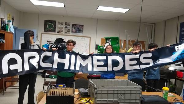Posing with our Archimedes banner