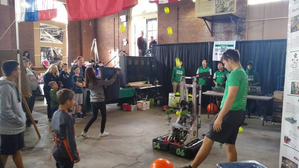 Engaging the crowd at the Tesla Electric Faire with our 2017 robot, Oscar